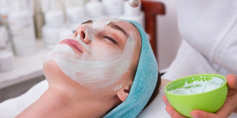 Lady getting a facial at a spa